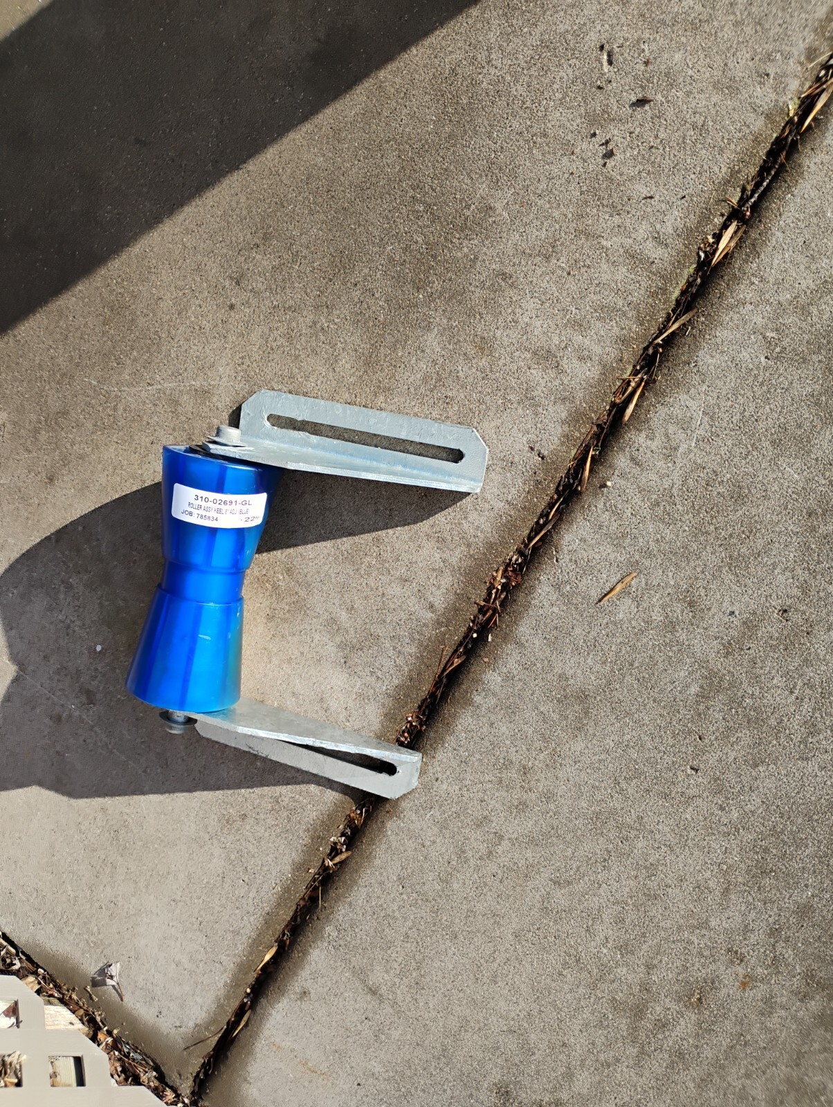NOS 8 inch Keel Roller Assembly with Blue Poly Roller and Galvanized Bracket