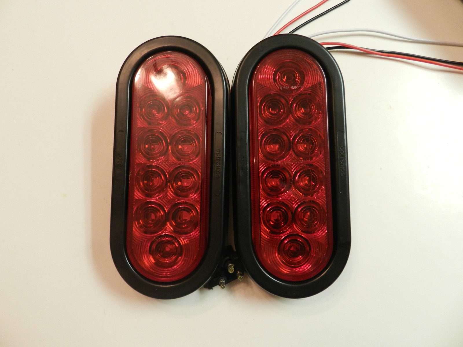 (2) RED 6″ Oval LED 10 Diode Tail Light w/grommet & plug Truck Trailer Optronics