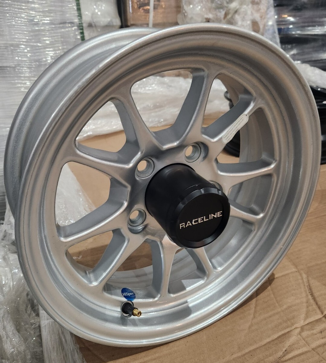 SINGLE 14″ X 5″ 5 LUG ON 4.5 ALUMINUM TRAILER WHEEL with CENTER CAP