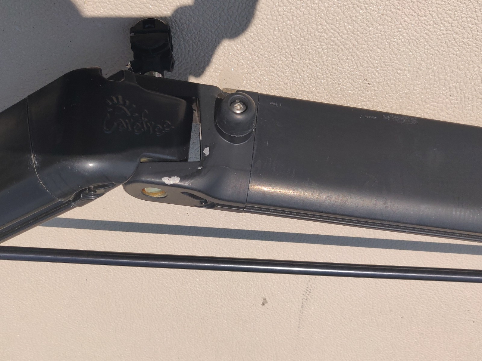 CAREFREE OF COLORADO LH AWNING ARM DUAL STAGE LATITUDE R001793-106 BlK IDLE SIDE