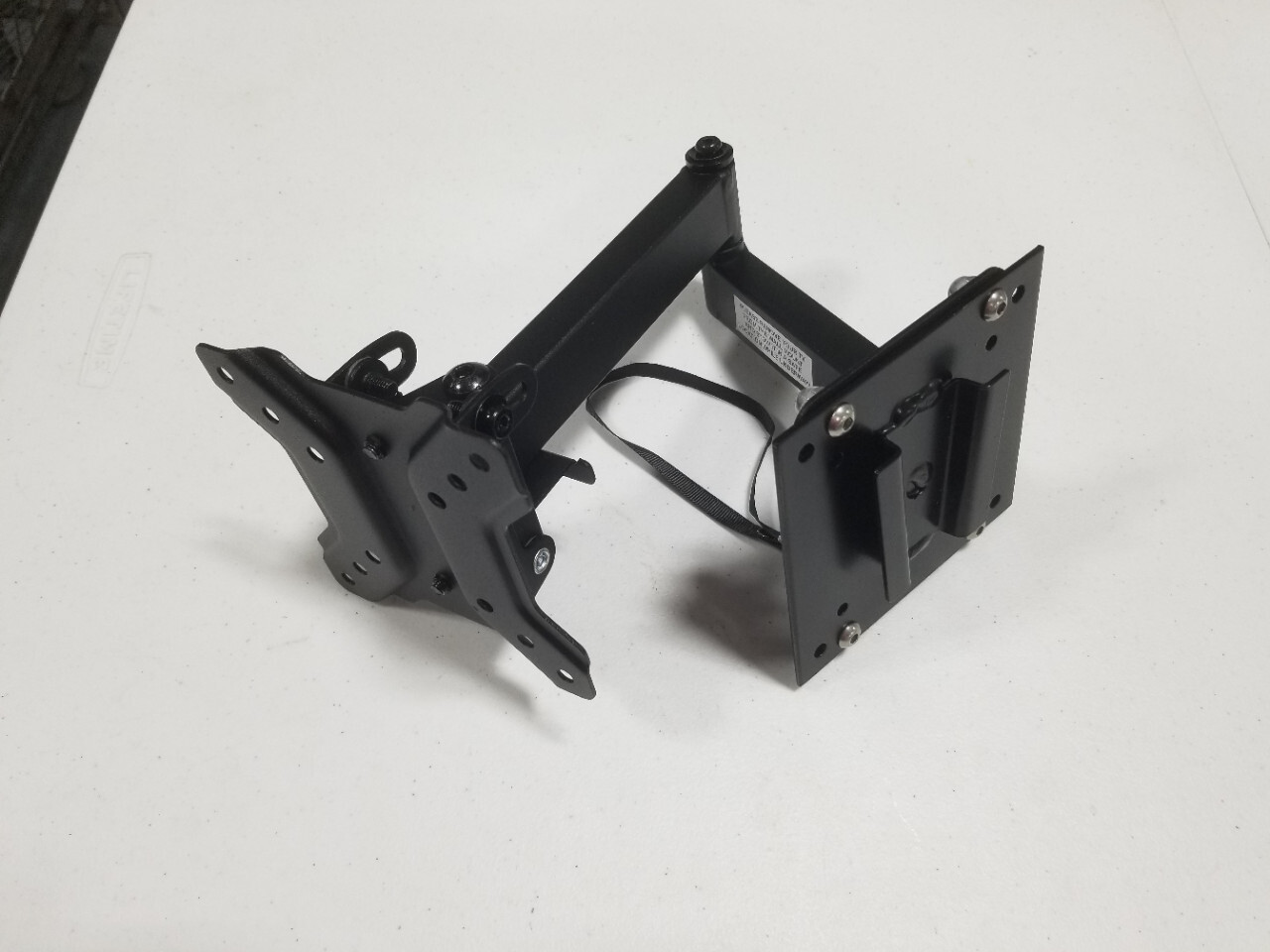 PAW Locking Swing Arm Mounted to a Steel RV TV Bracket