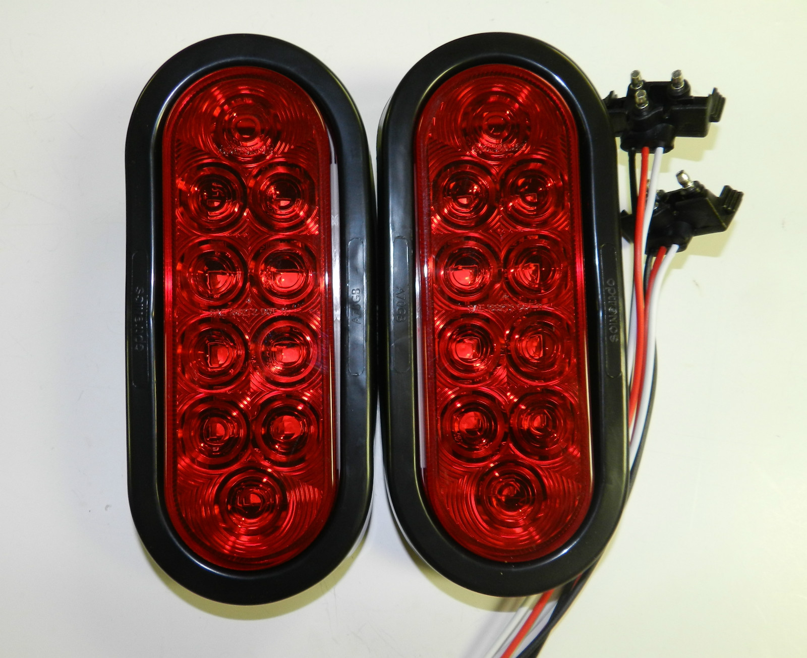 (2) RED 6″ Oval LED 10 Diode Tail Light w/grommet & plug Truck Trailer Optronics
