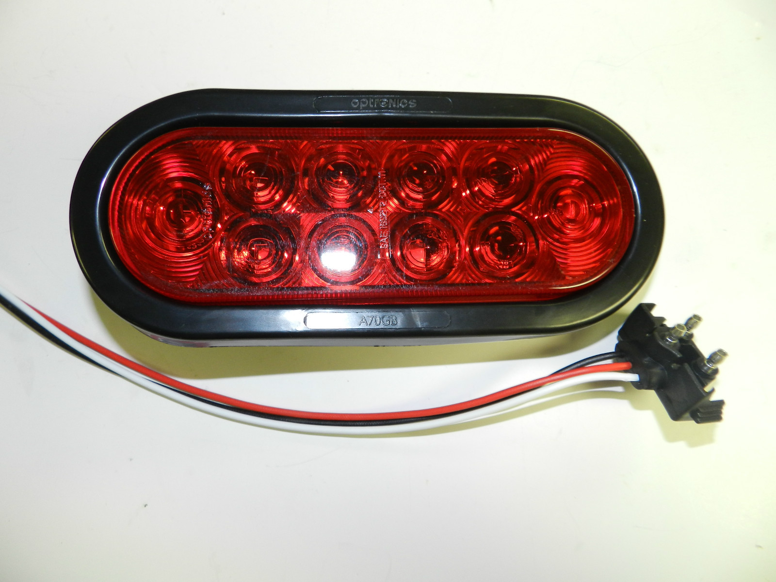 (2) RED 6″ Oval LED 10 Diode Tail Light w/grommet & plug Truck Trailer Optronics