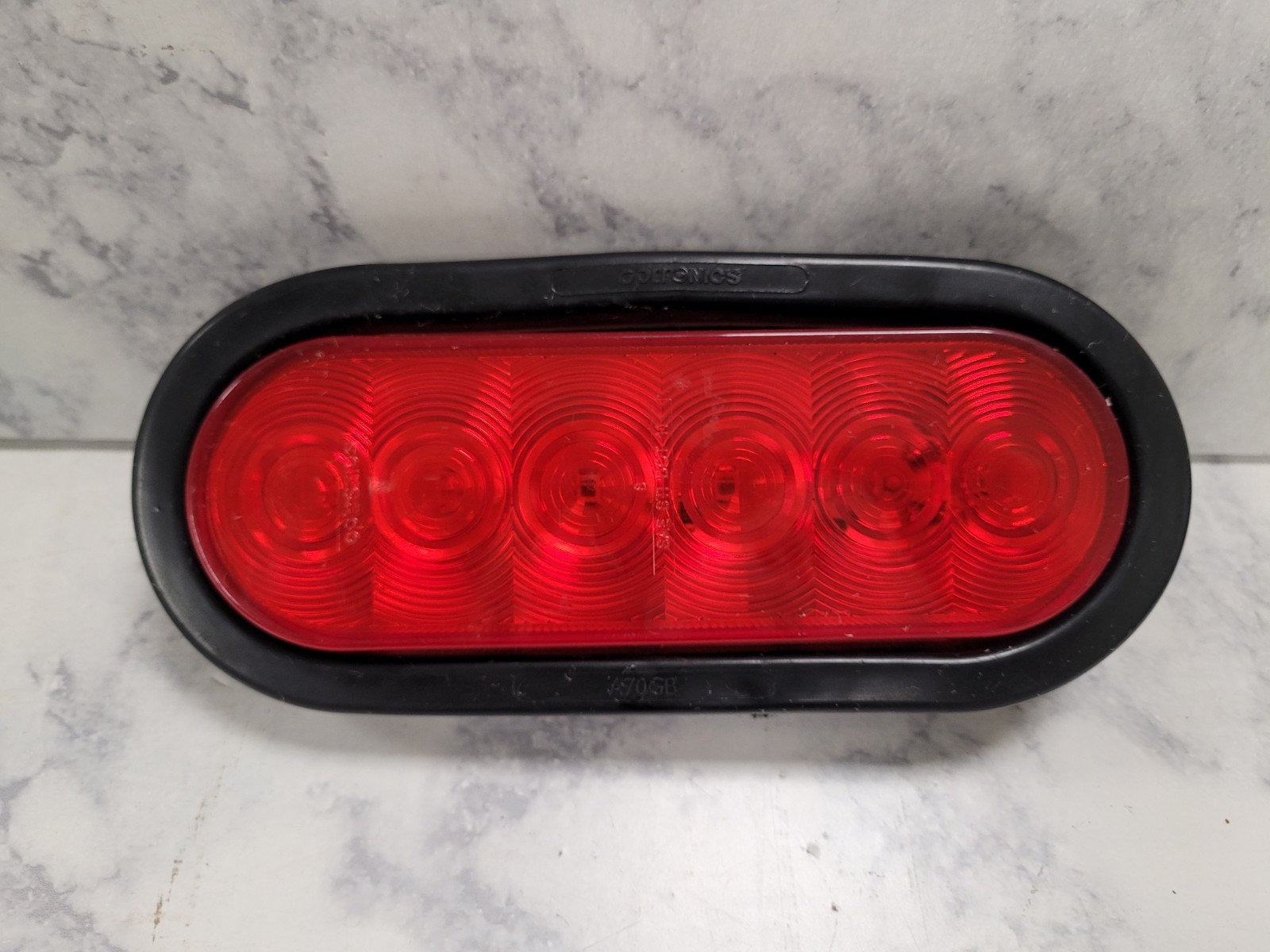 Optronics STL-12RB LED Fleet Red Stop/Turn/Tail 6 inches Oval with grommet