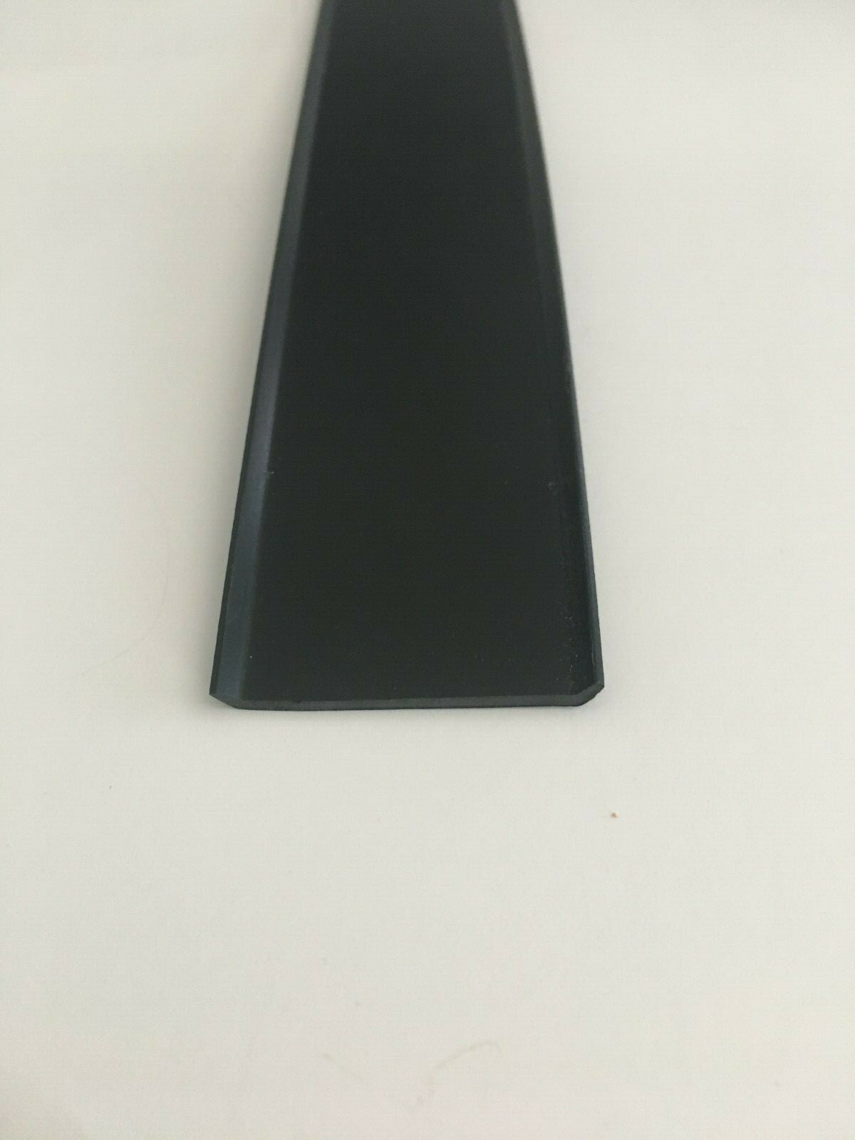 SAMPLE of 1 1/2″ BLACK Vinyl Insert 1/16″ Thick Trim Flexible RV Screw Cover