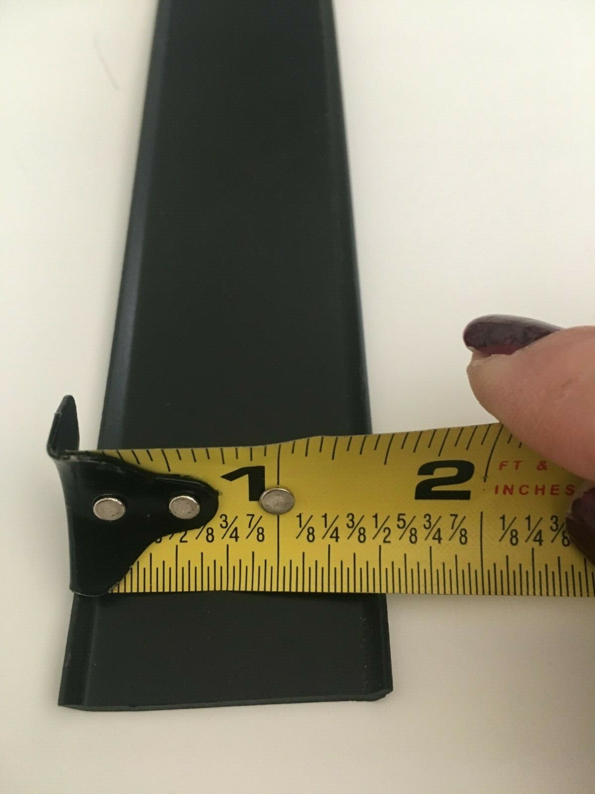 SAMPLE of 1 1/2″ BLACK Vinyl Insert 1/16″ Thick Trim Flexible RV Screw Cover