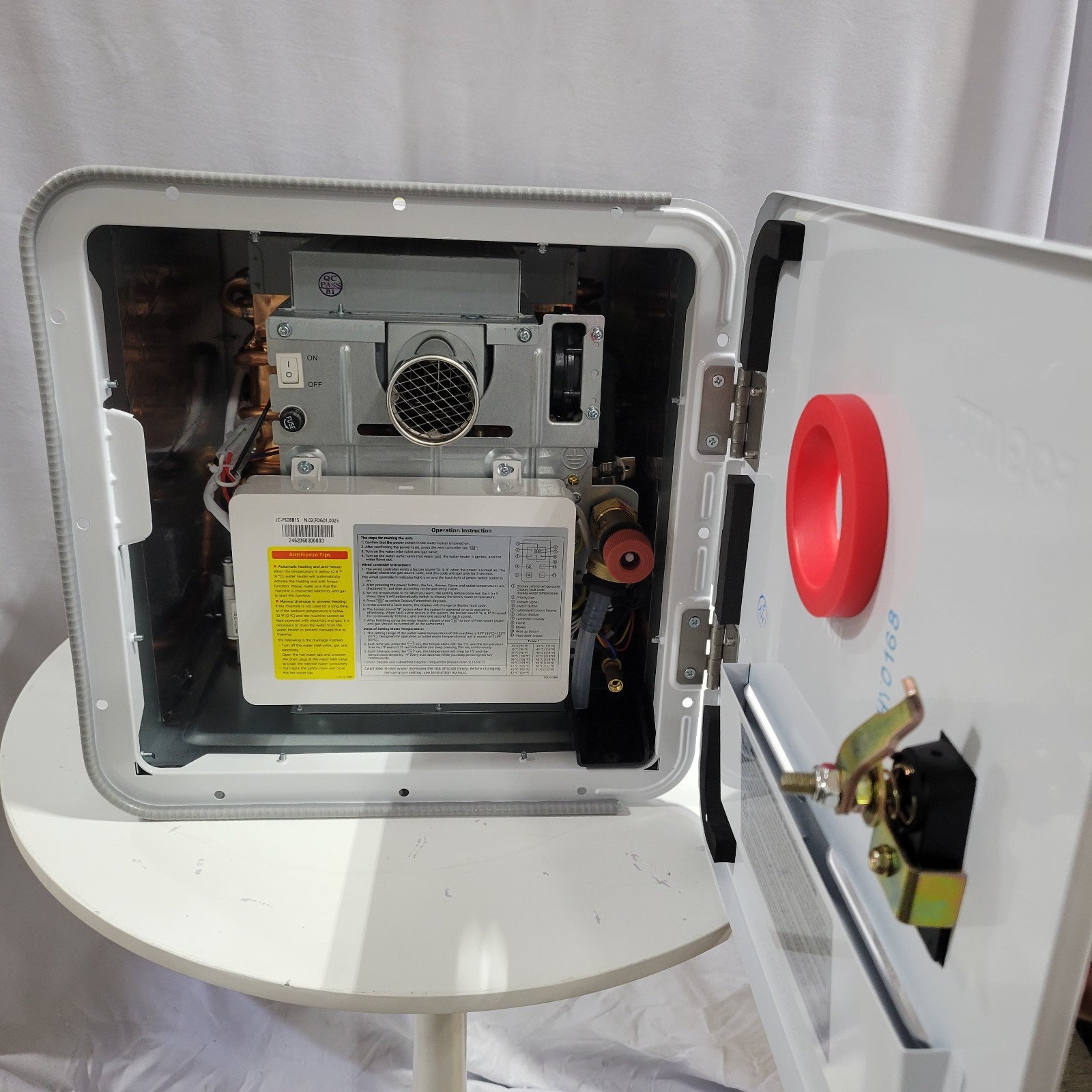 RVPart Pro RV Tankless Water Heater Propane with 15 x 15 in Black Door 12V USED