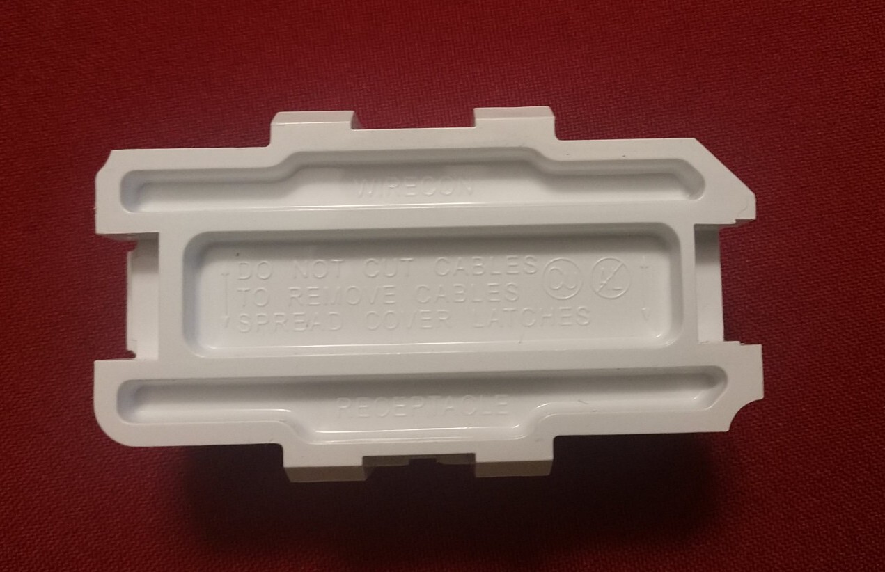 Wirecon Self-Contained Universal Single 20A Recept Black w/Backer &Wall Plate RV