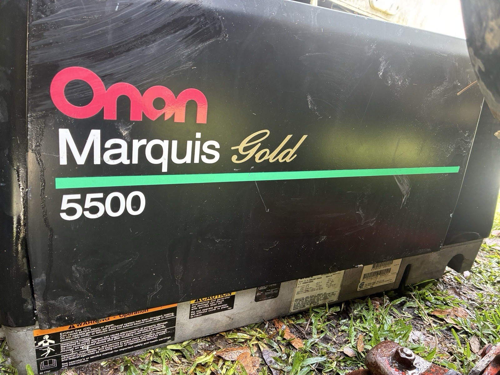 Onan Marquis Gold 5500 Model No. 5-5HGJAB-59000. 120 Volts 45.8 Amps. Gasoline.