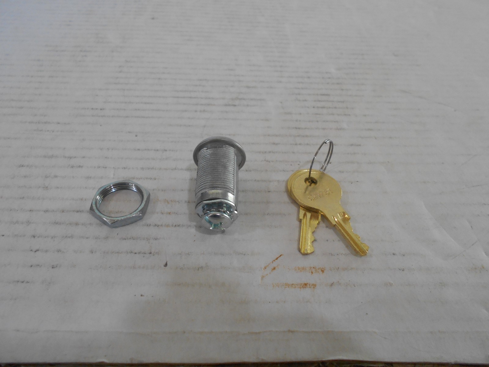*STORAGE COMPARTMENT DOOR CAM LOCK
