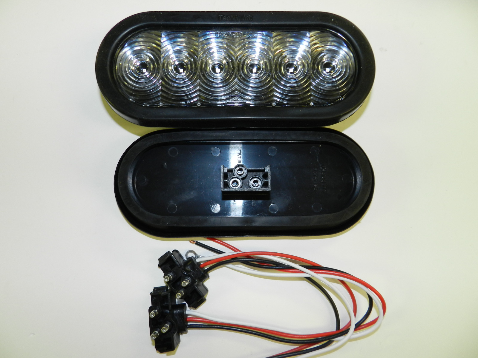(4) Trailer Truck LED Sealed CLEAR/ RED 6″ Oval Stop/Turn/Tail Light Made in USA